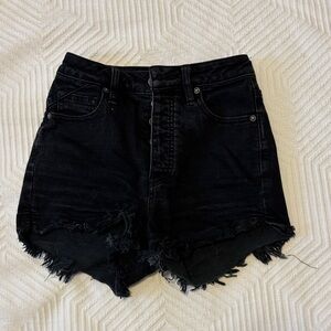 Distressed black denim shorts